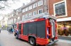 Brand door kortsluiting op zolder boven winkel in Waterstraat