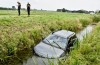 Nat, maar ongedeerd: ouder echtpaar belandt in Waardenburgse sloot