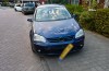Aanrijding tussen auto en scooterrijder